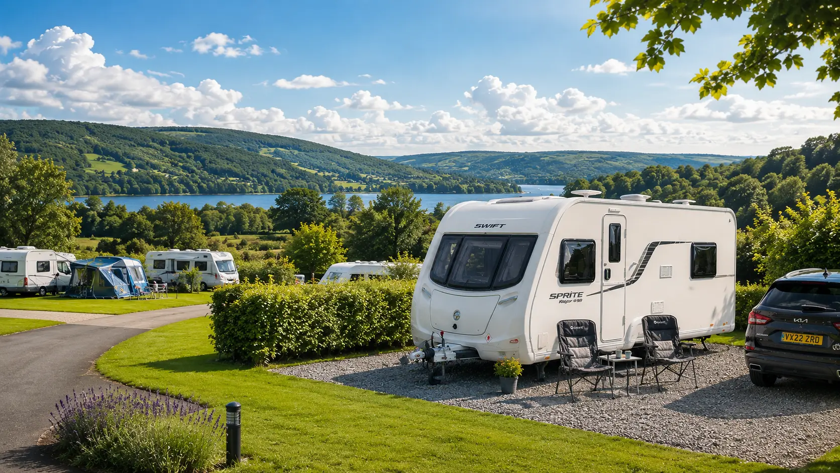 Scenic UK caravan site with modern British touring caravan on spacious countryside pitch