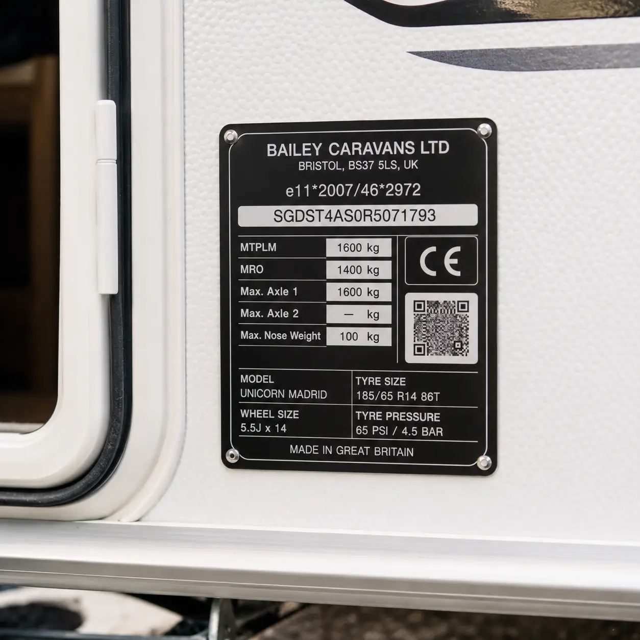 UK caravan manufacturer weight plate beside entrance door
