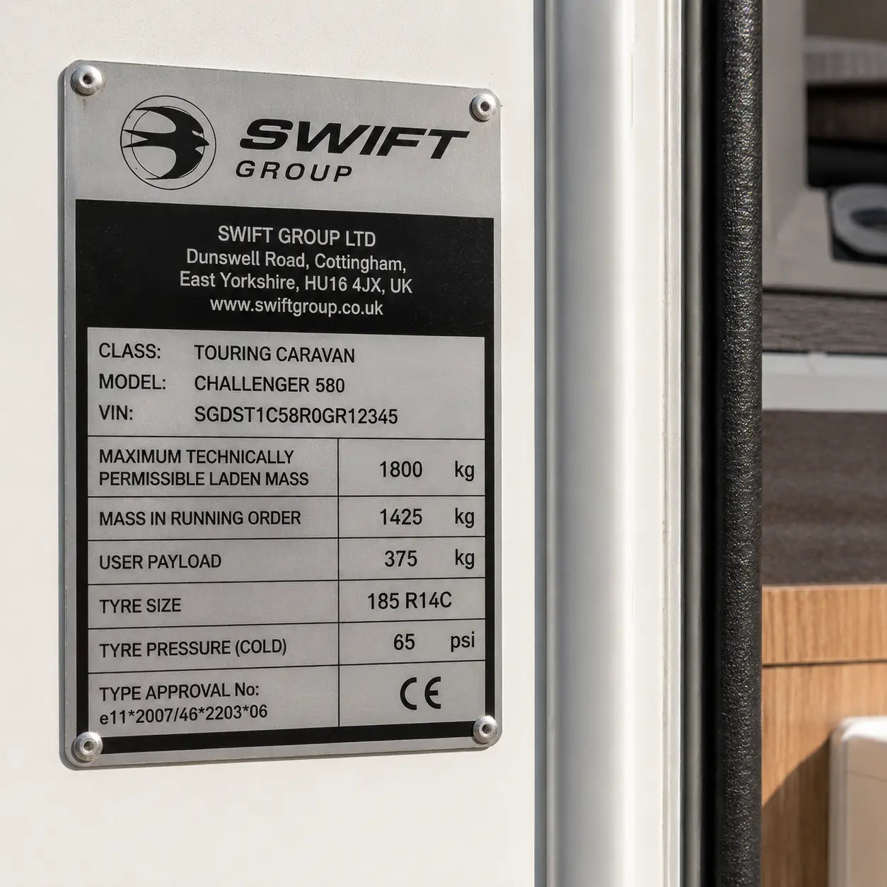 Manufacturer weight plate showing caravan weight information